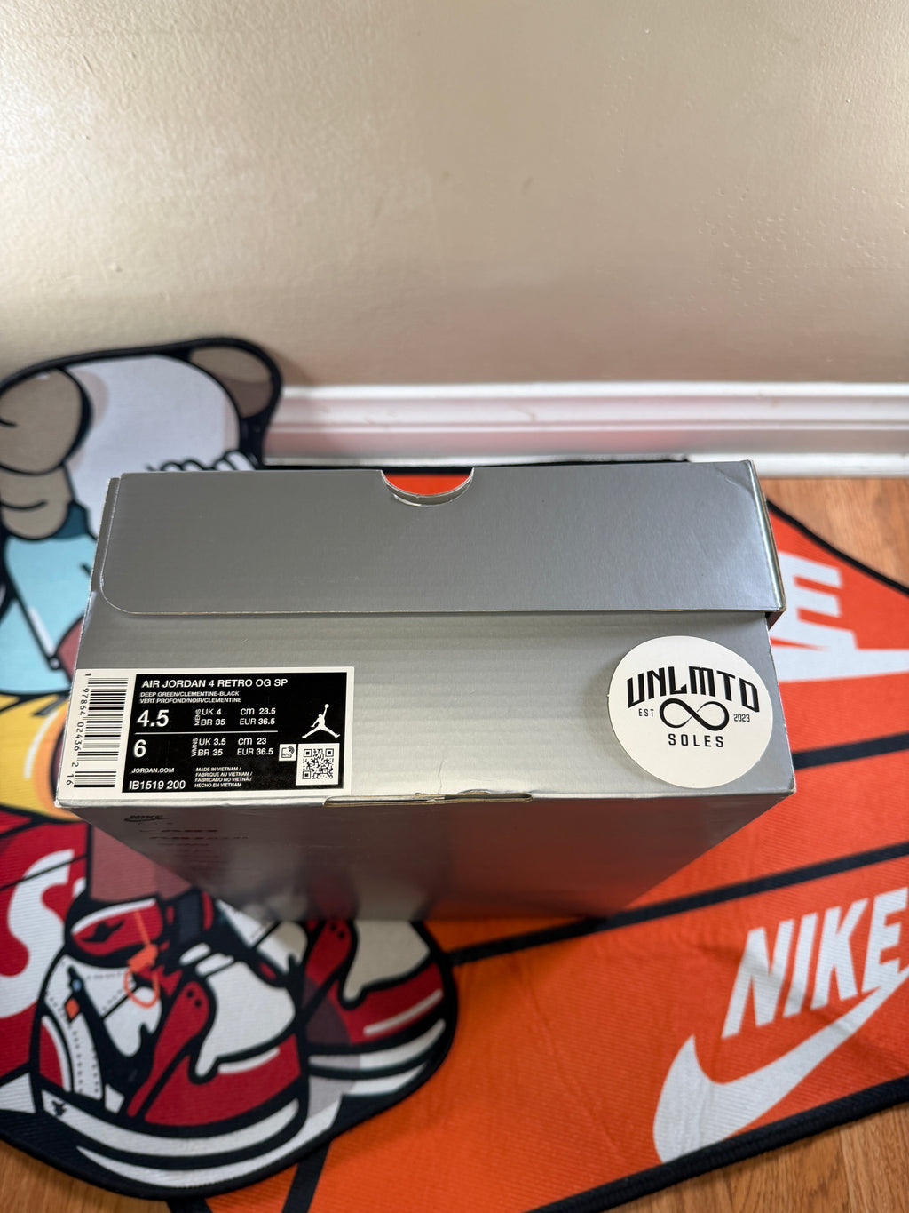 Air Jordan 4 Retro OG 'Undefeated' 2025 box with shoe description size 4.5 men