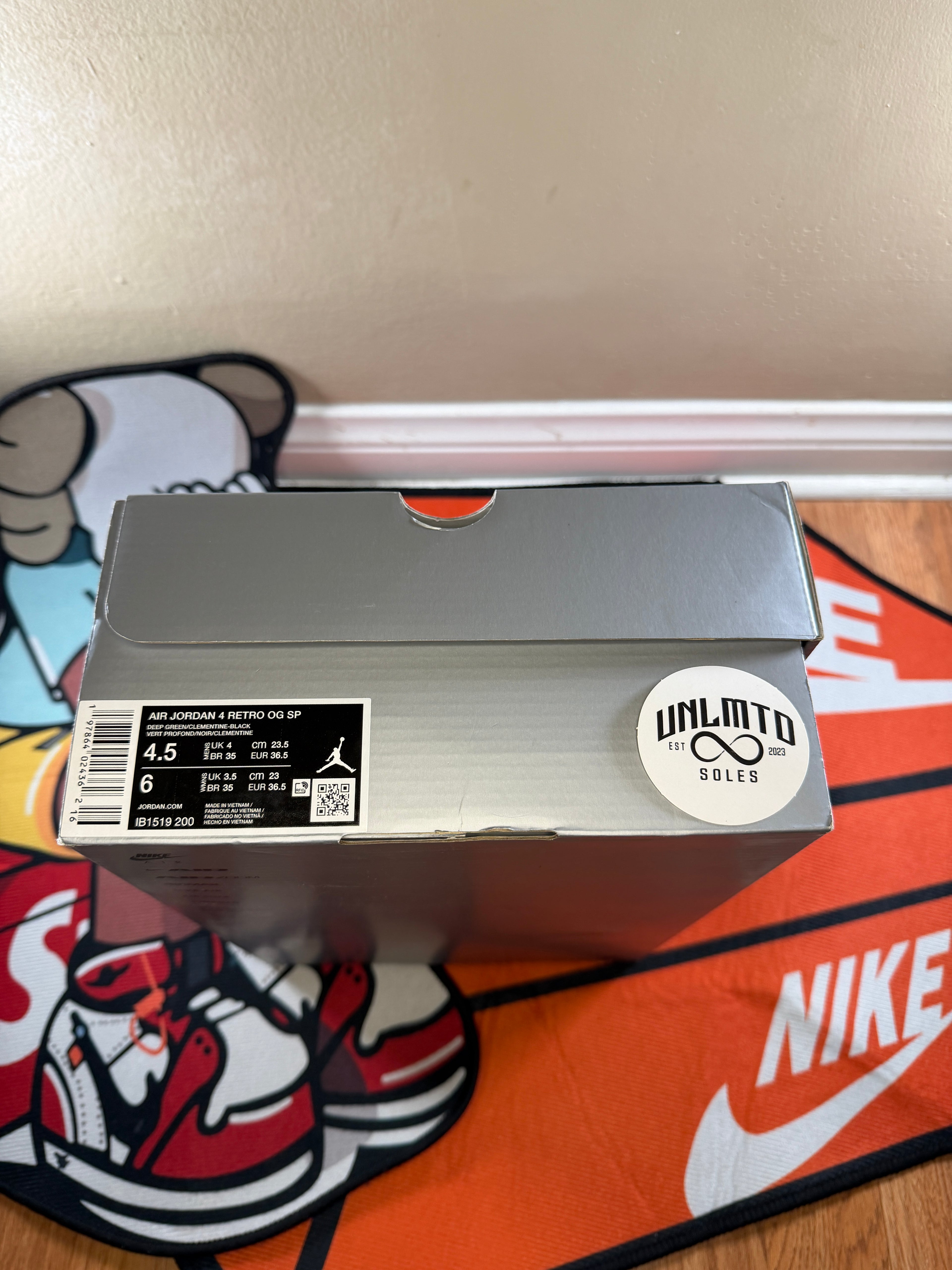 Air Jordan 4 Retro OG 'Undefeated' 2025 box with shoe description size 4.5 men