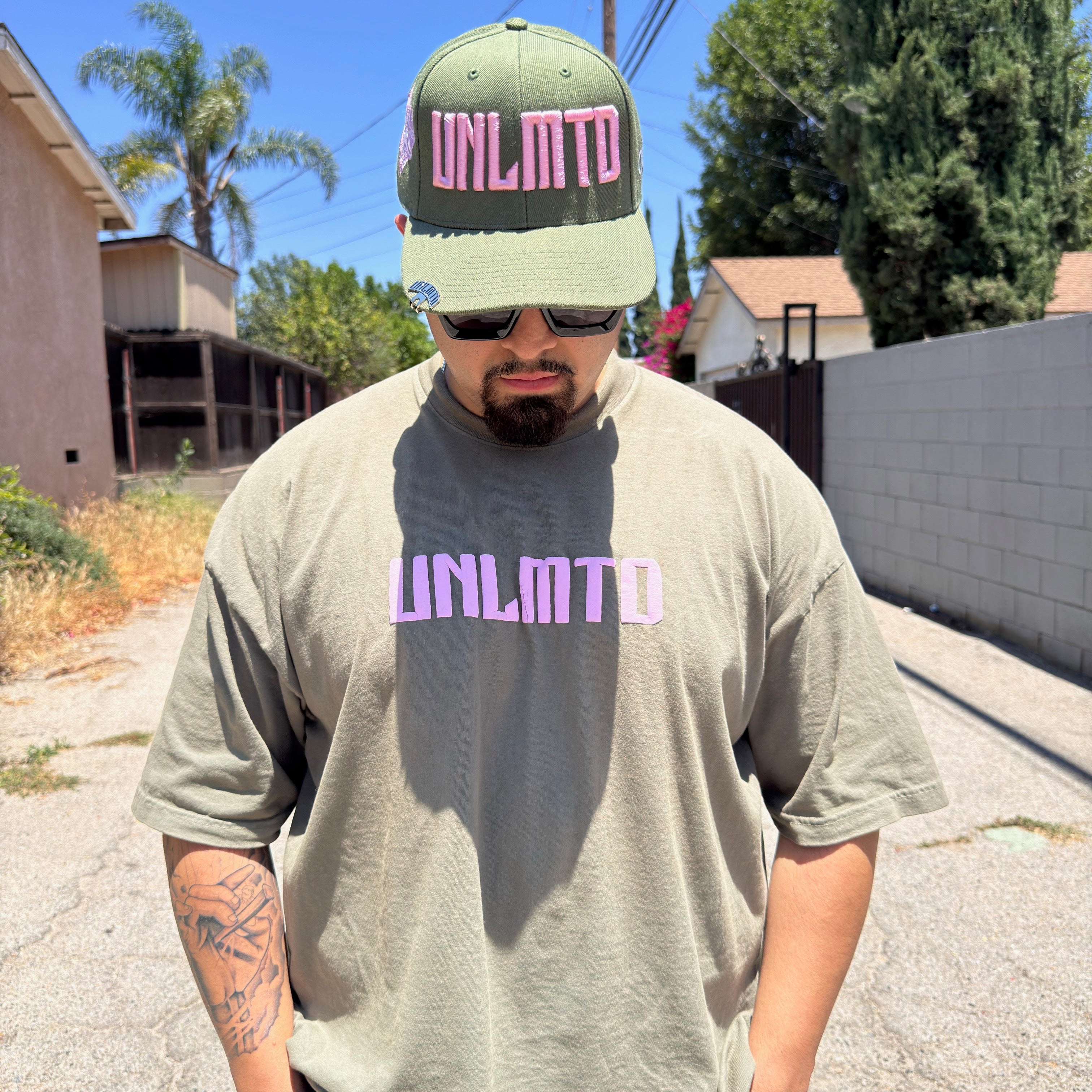 Male modeling Olive green shirt with matching hat 