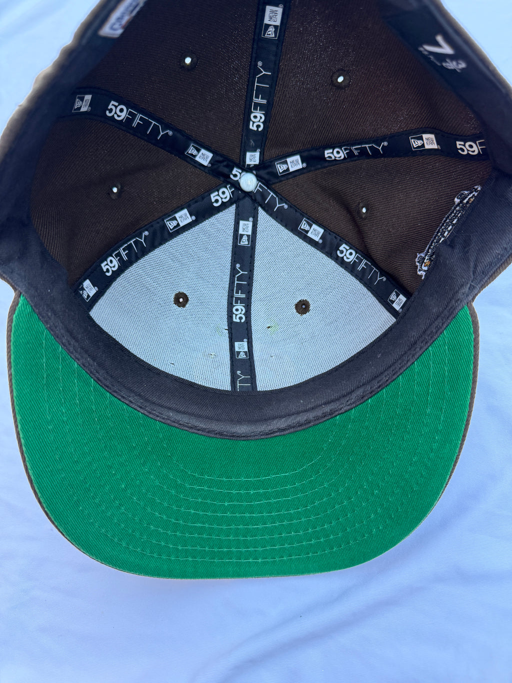 Inside view of hat, green under brim