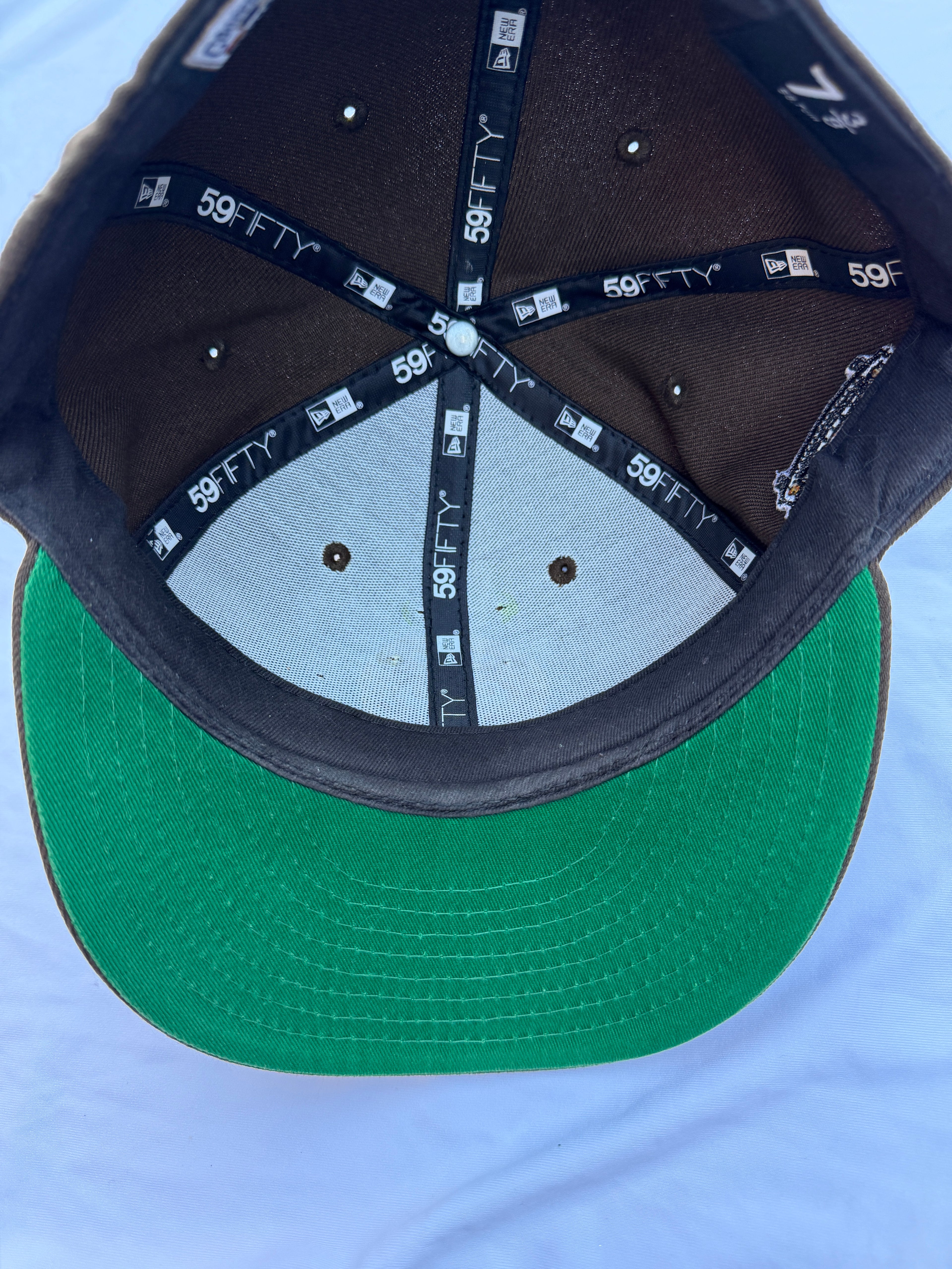 Inside view of hat, green under brim
