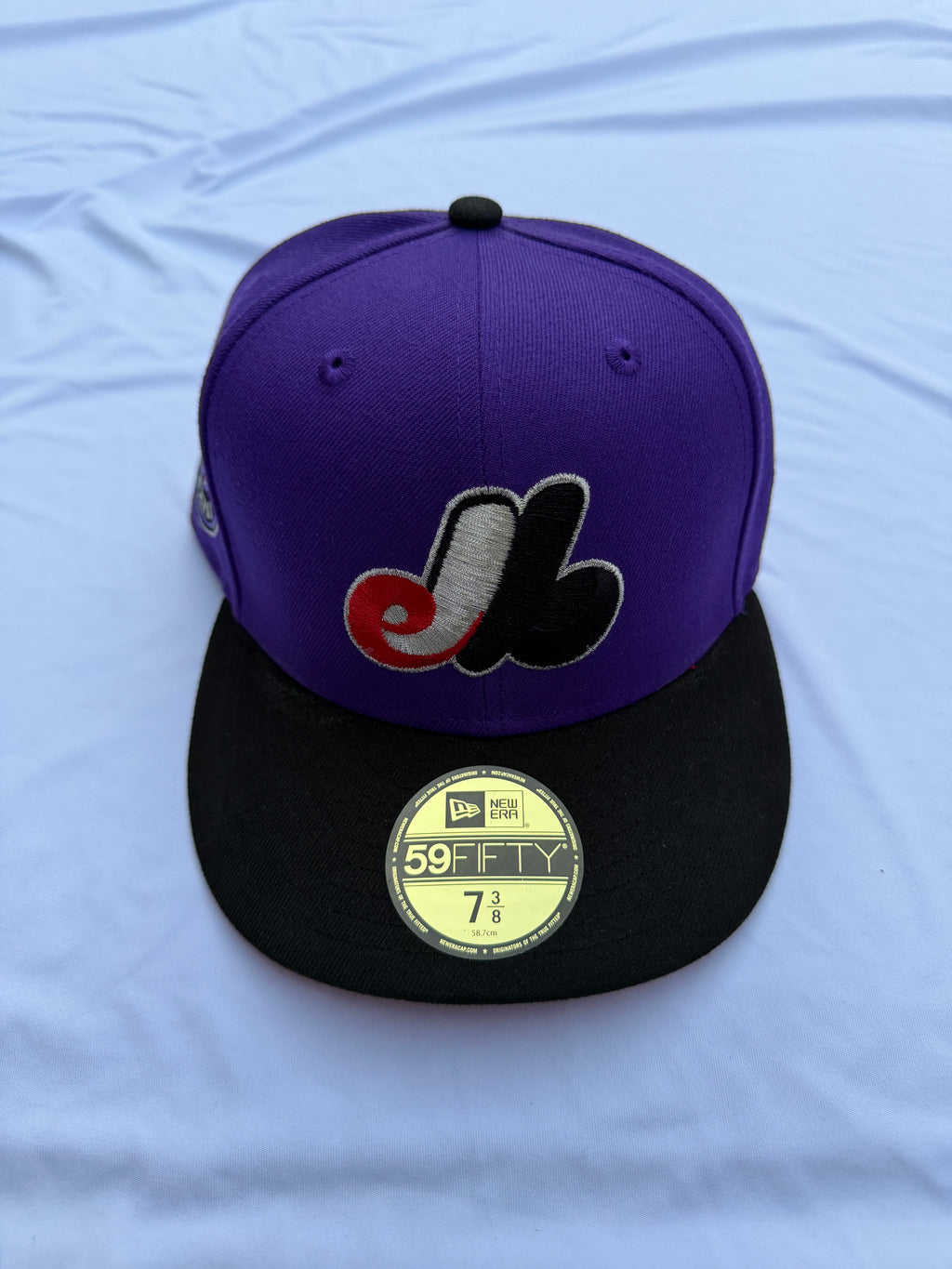 New Era 59fifty Hat Club Montreal Expos TDot Collection Front view purple with black brim 