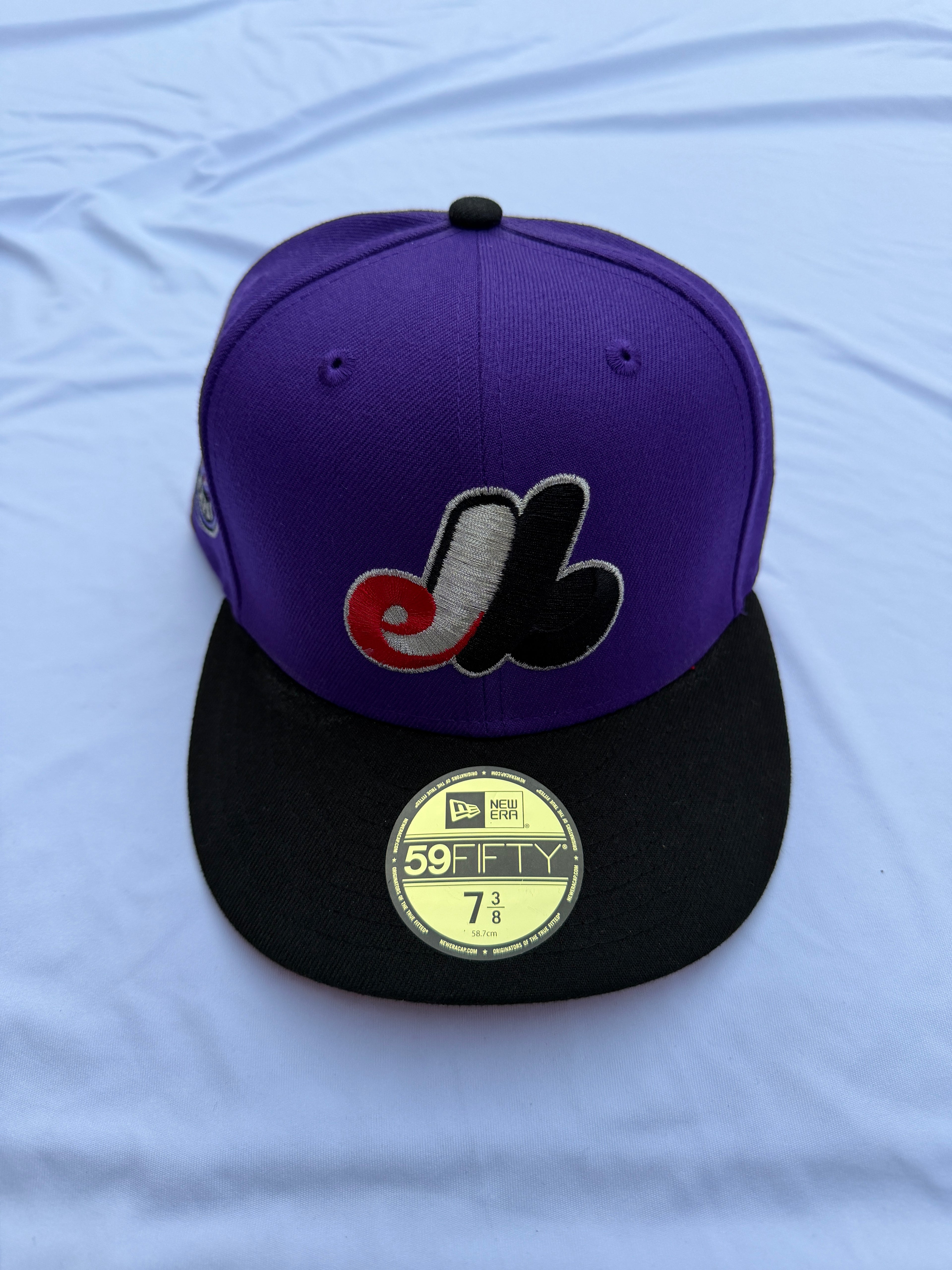 New Era 59fifty Hat Club Montreal Expos TDot Collection Front view purple with black brim 