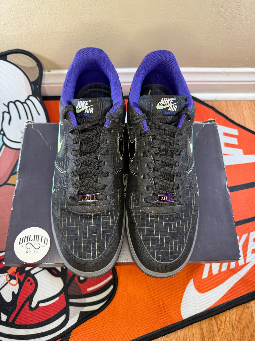 Top/Front view of shoes. Nike air on the tongue and black laces 