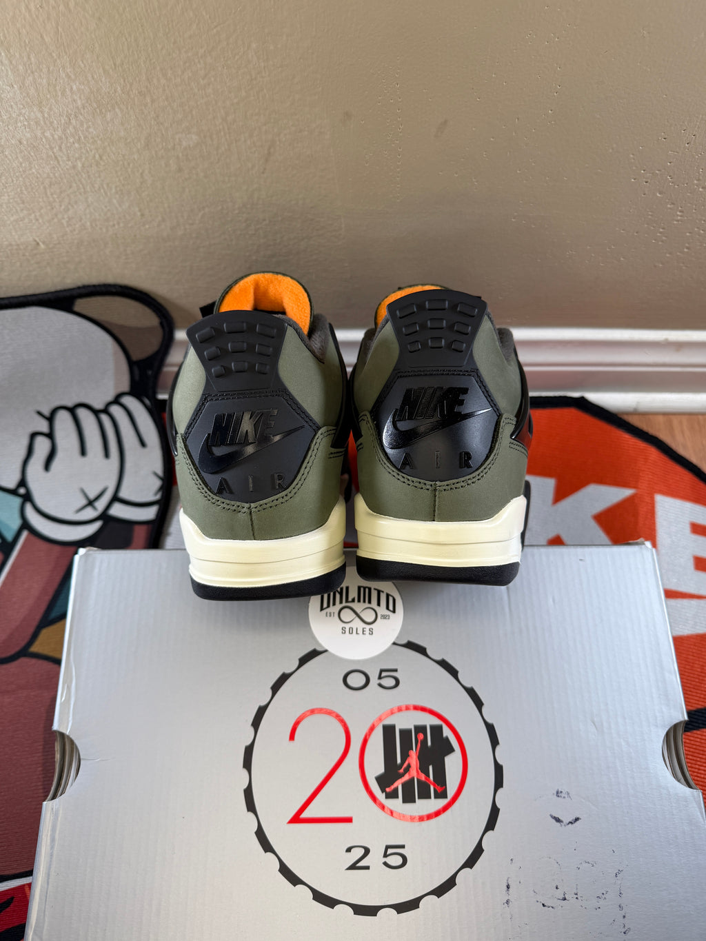 Air Jordan 4 Retro OG 'Undefeated' 2025 sneakers in green and black back view