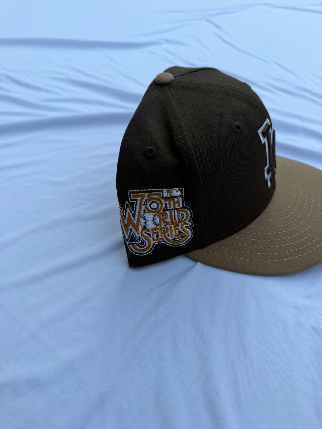 Brown with light brown brim New Era 59FIFTY Los Angeles Dodgers hat side view with 75th World Series patch on left side
