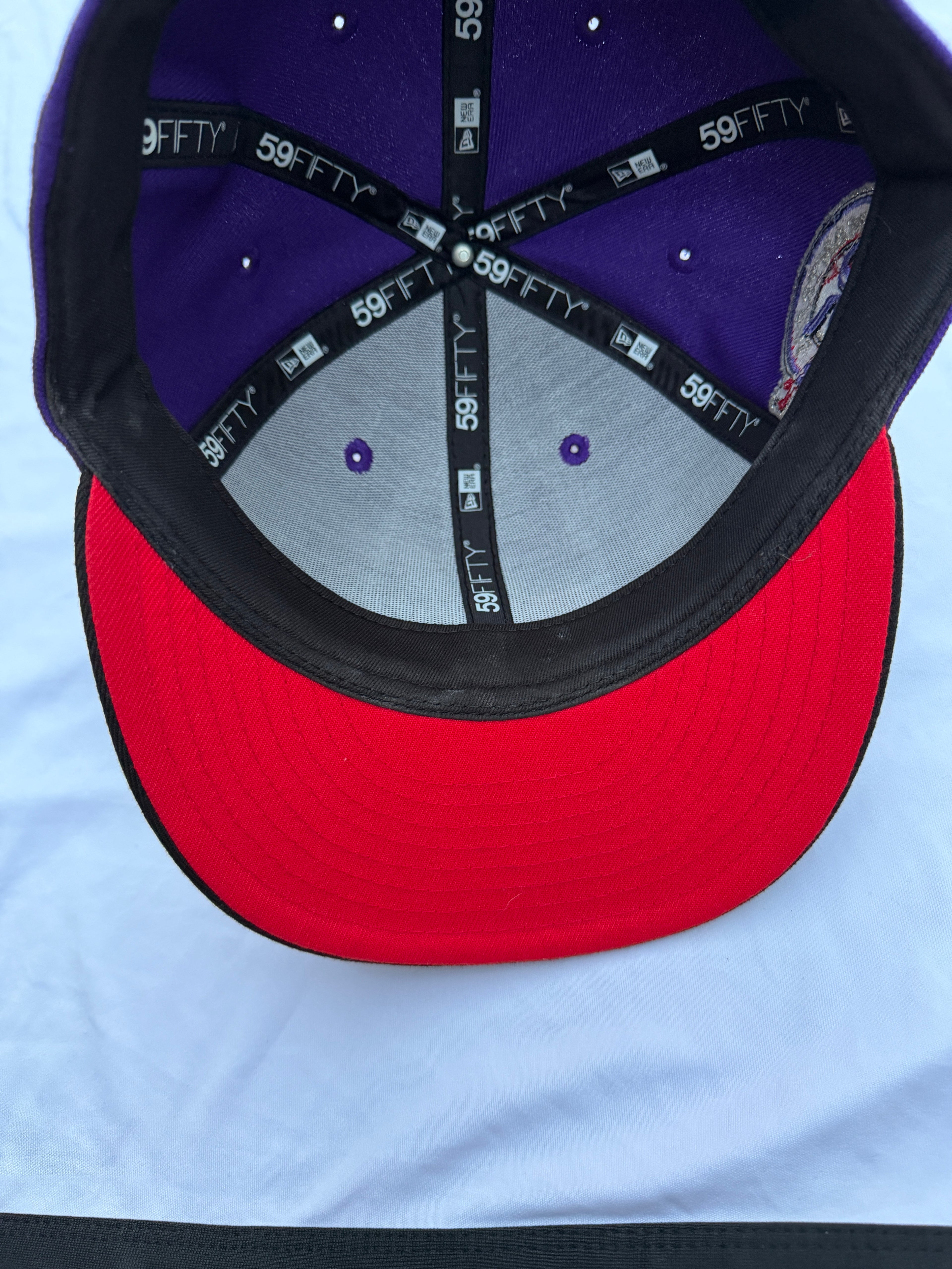 Under view of cap with red under brim
