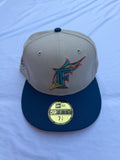Preowned size 7 3/8 New Era Miami Marlins Ocean Drive Exclusive 1997 World Series 59Fifty fitted beige with blue brim 