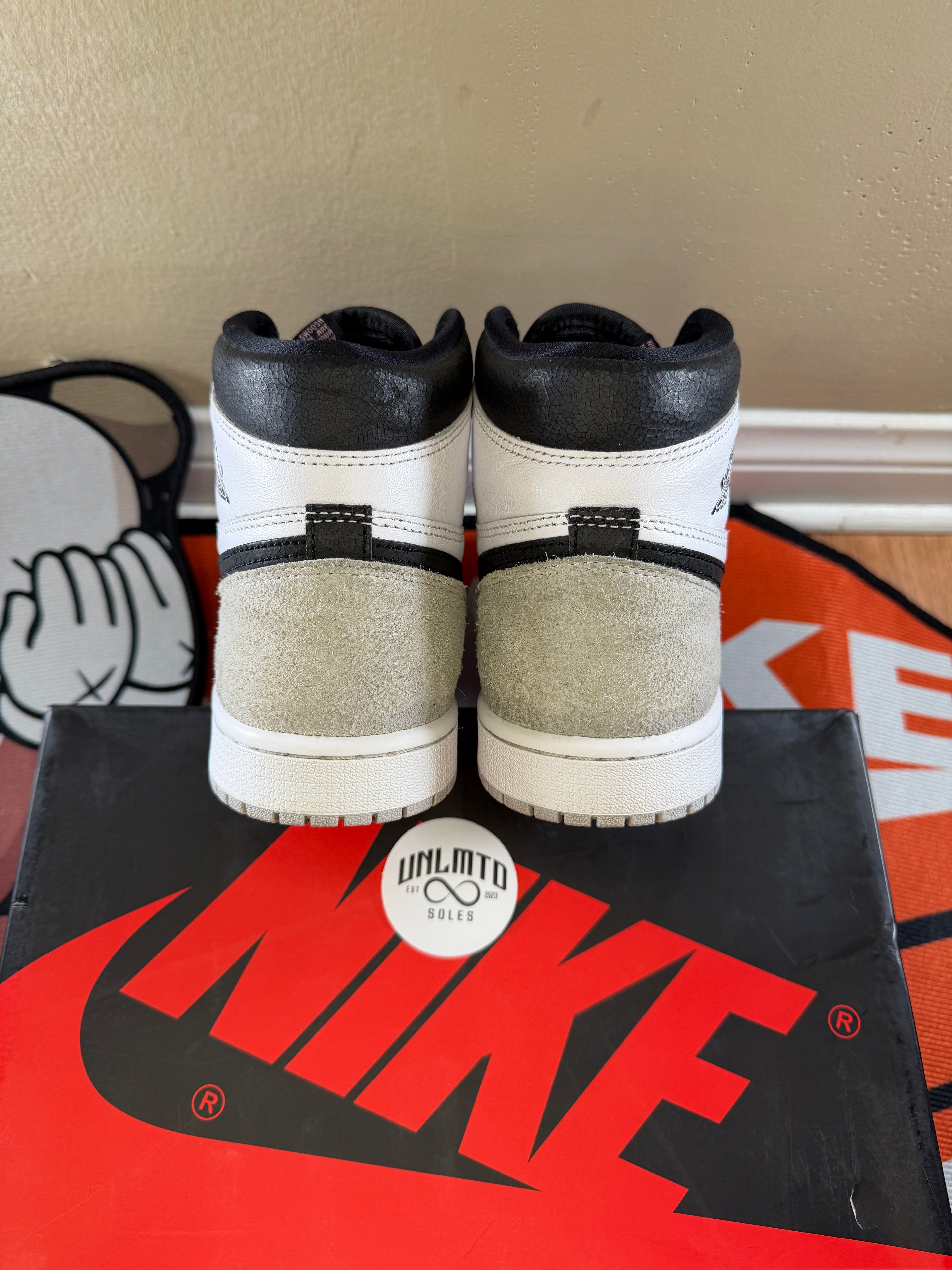 Jordan 1 retro High OG Bleached coral sneakers in white coral with black accents back view
