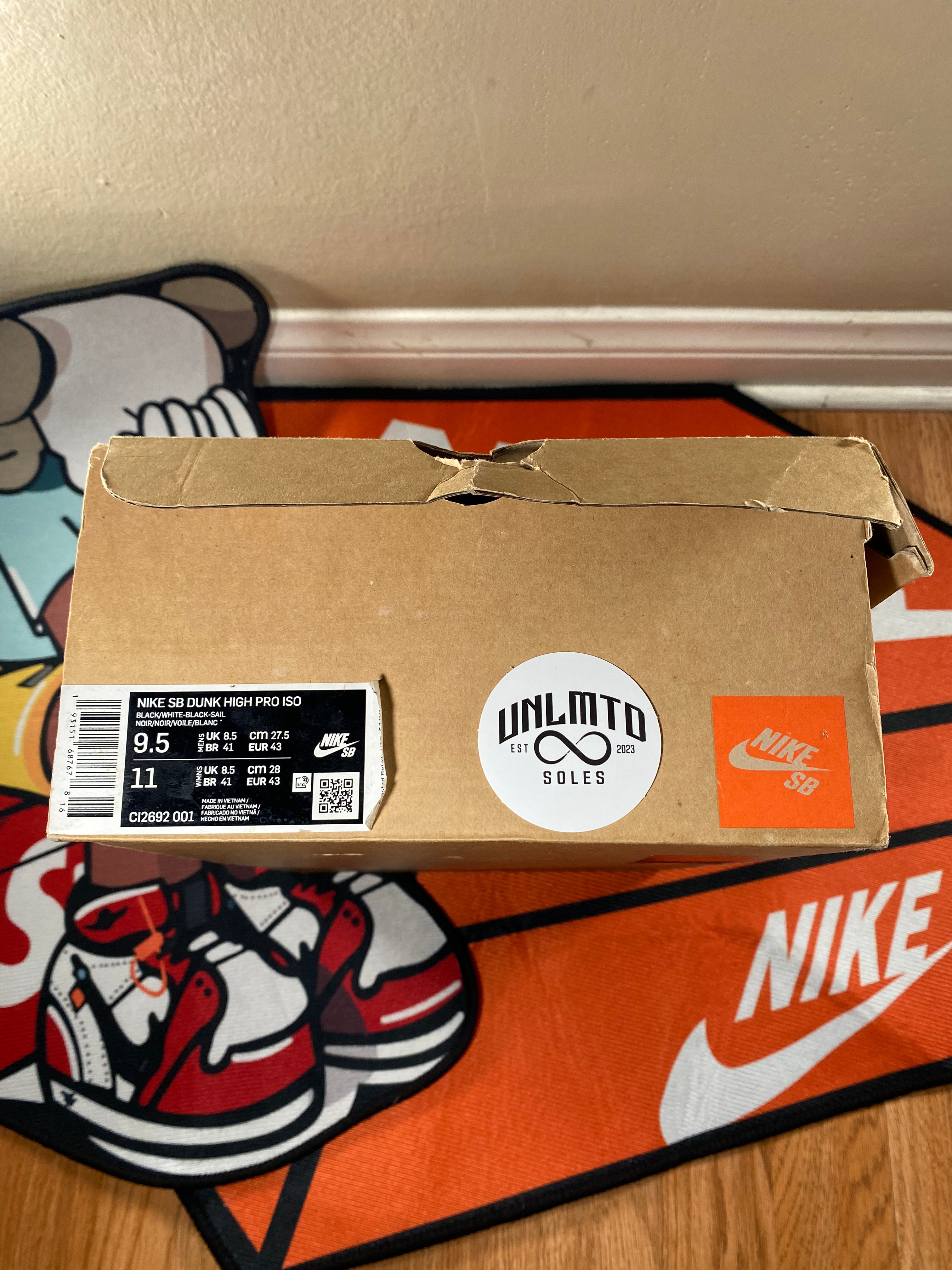Brown shoe box with shoe description and 9.5 size 
