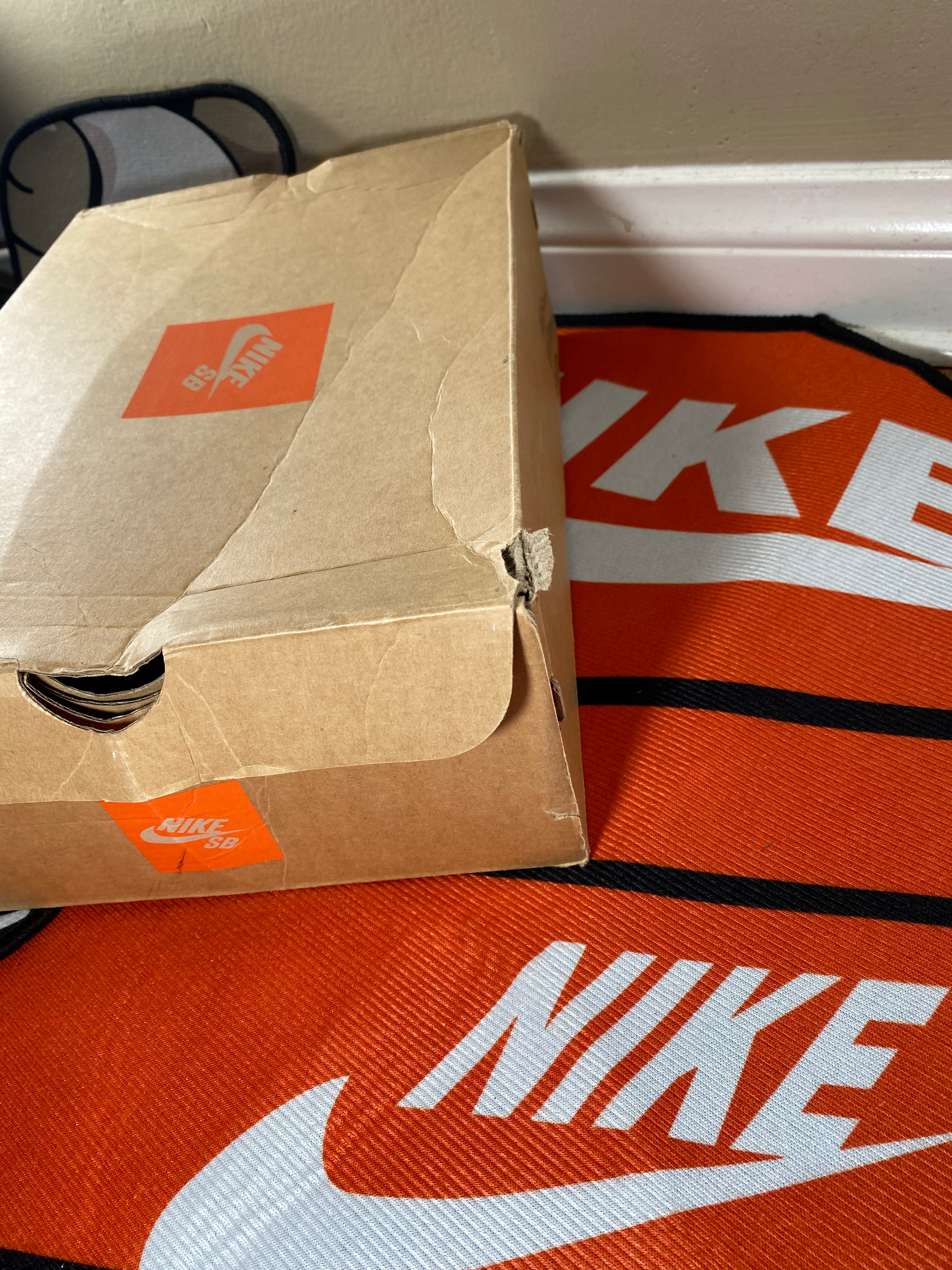 Brown shoe box, slightly damaged 