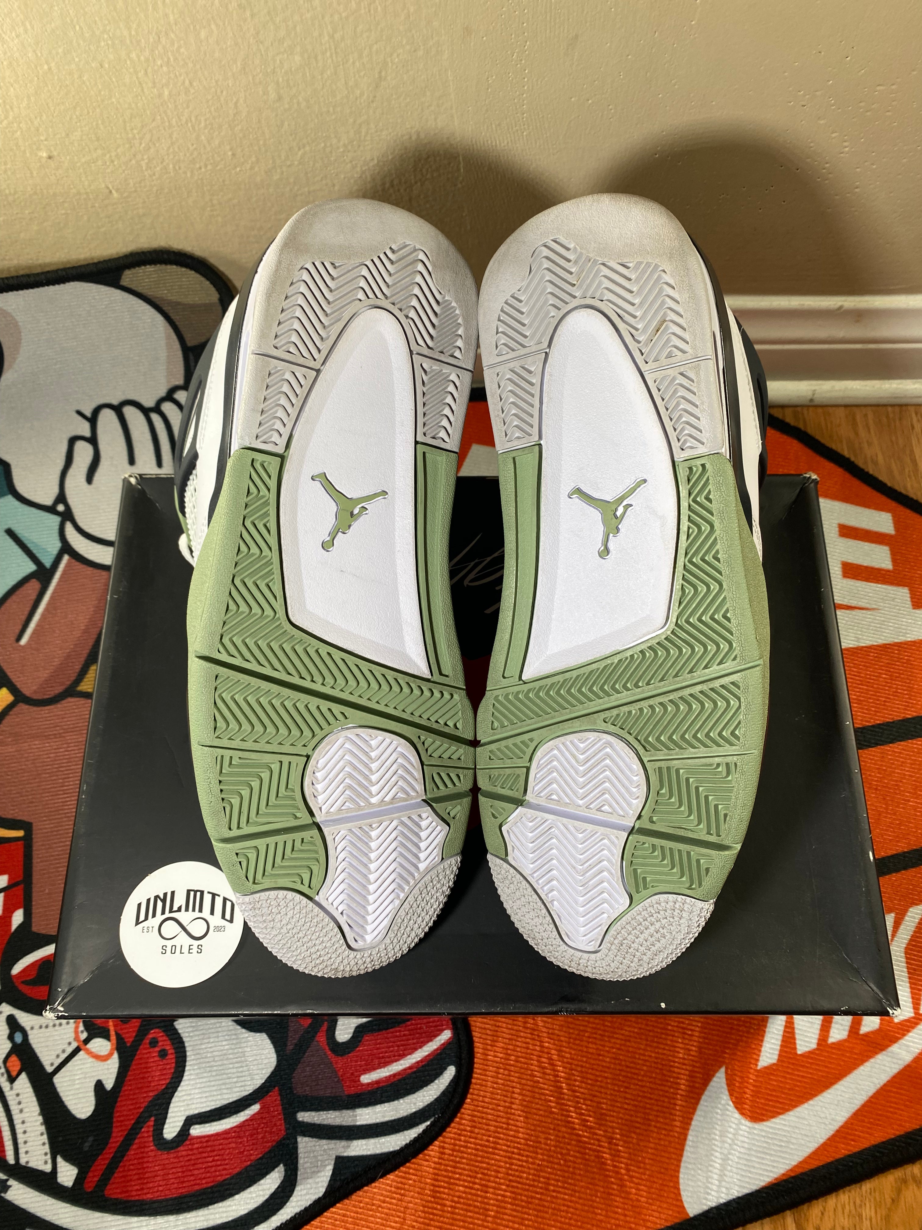 White and light green soles with small light green Jordan Jumpman 