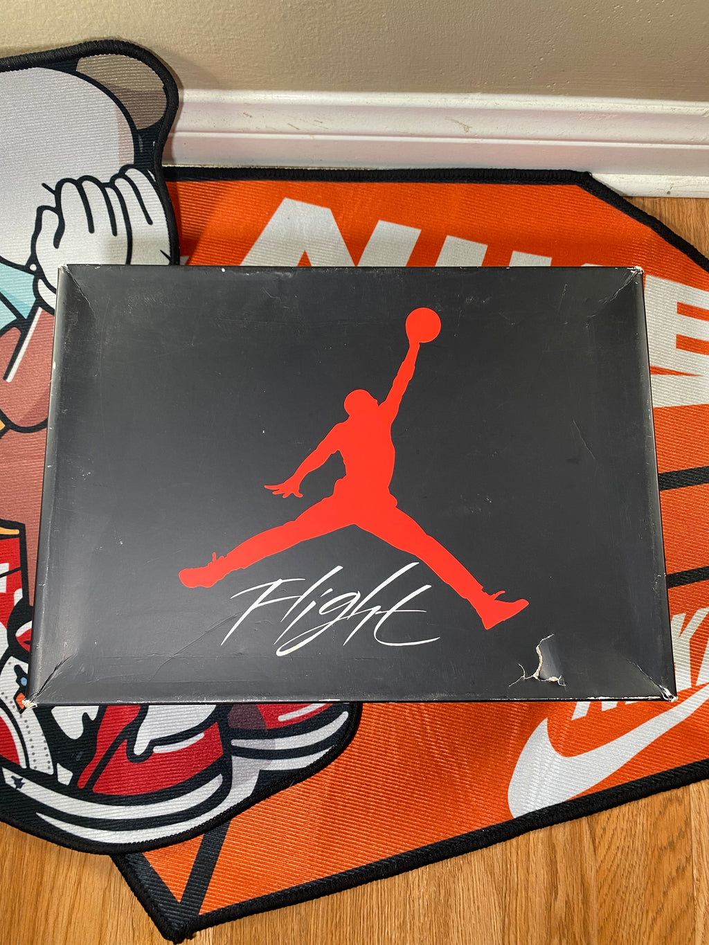 Top view of Jordan box black with red Jordan Jumpman 