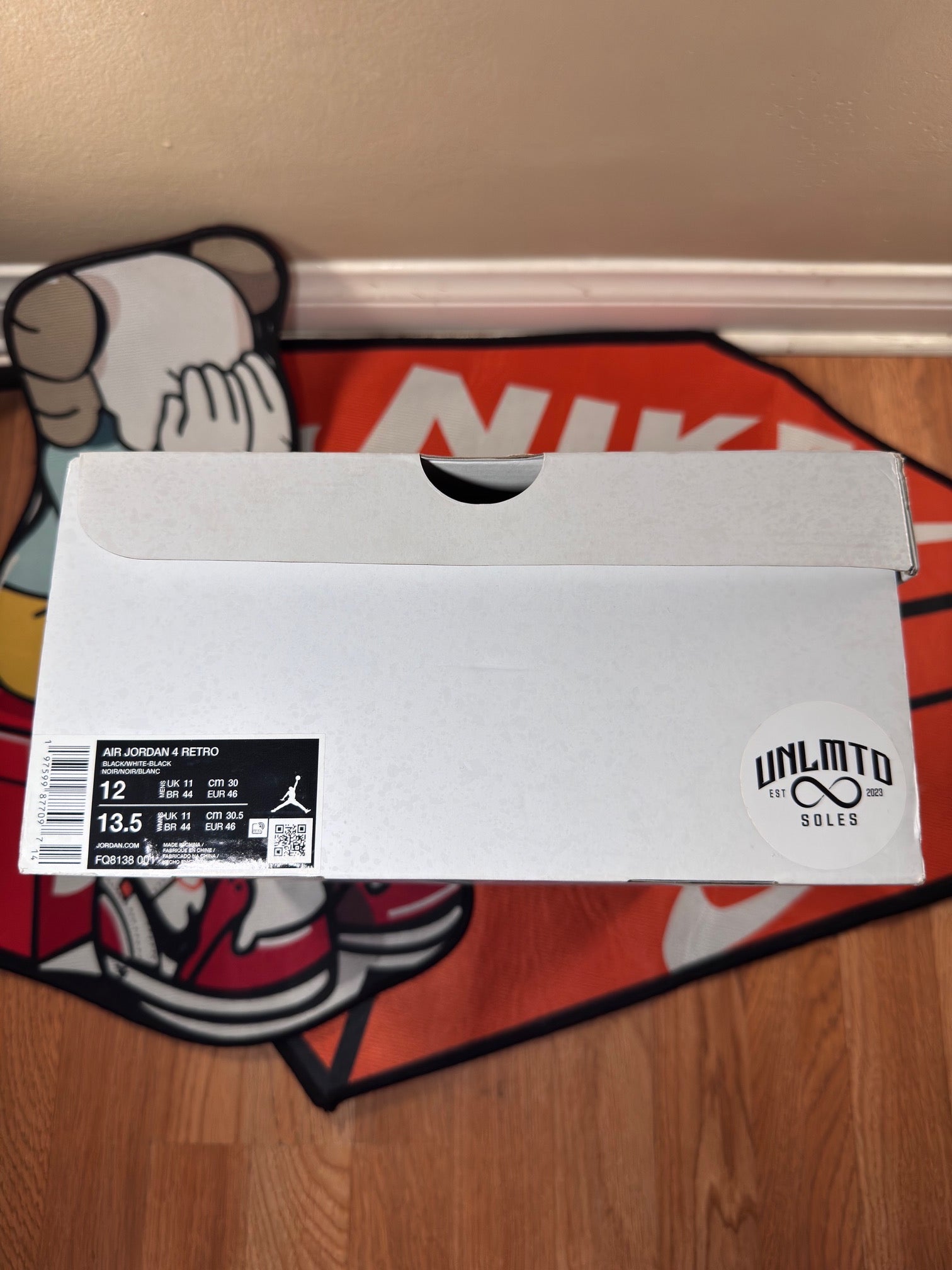 White shoe box with description 
