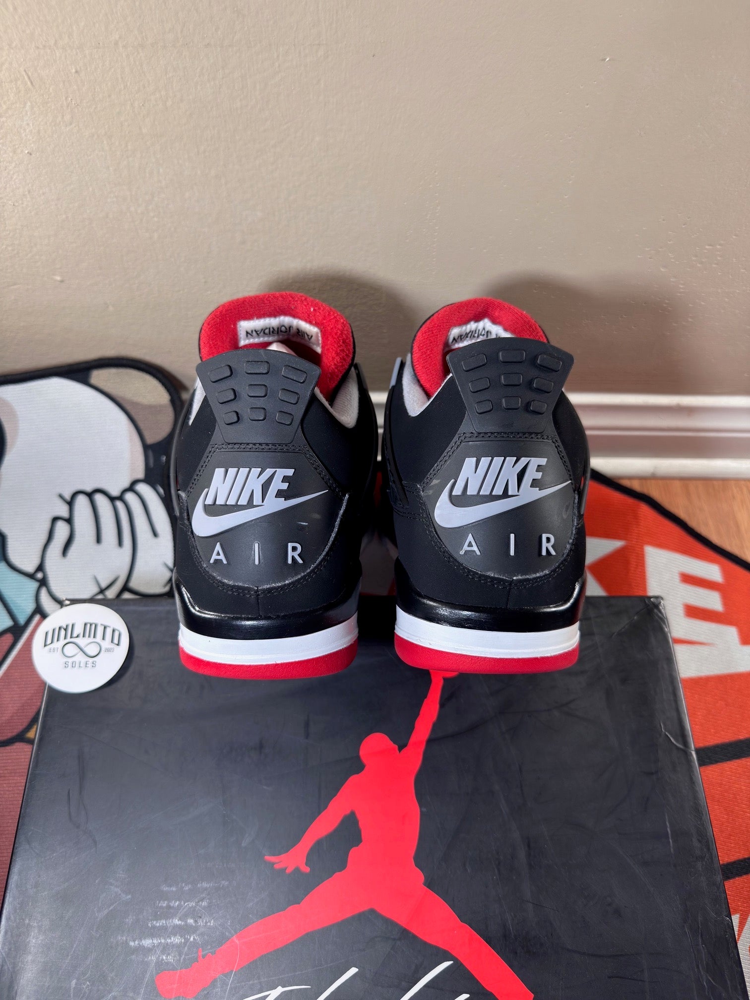 Back view of the same shoe, black work grey Nike air logo