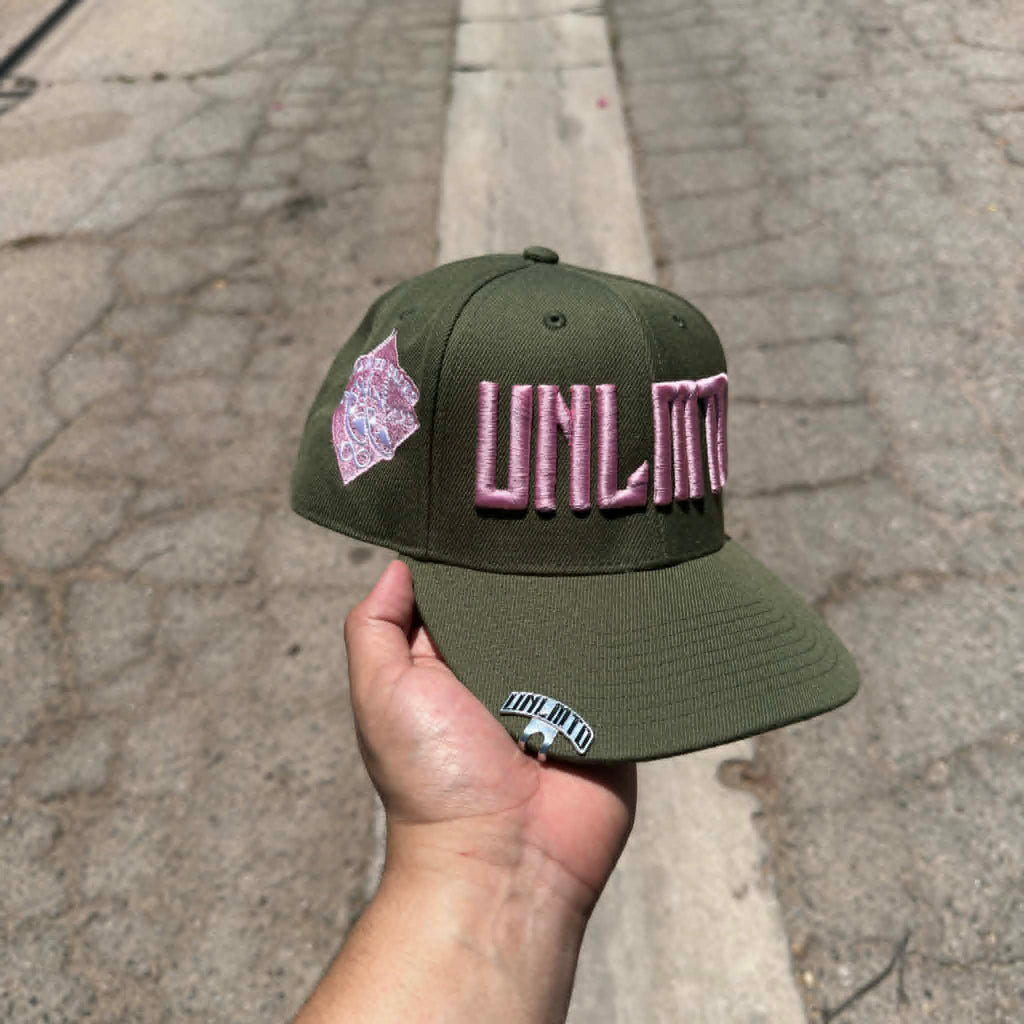 Olive green cap with pink 'UNLMTD' branding